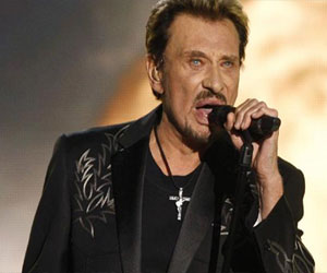   مصر اليوم - المطرب الفرنسي جوني هوليداي يتهرب من الضرائب