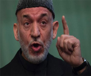   مصر اليوم - كرزاي يؤكد ان بلاده لن توقع اتفاقًا مع واشنطن تحت الضغط