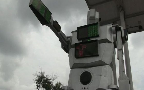   مصر اليوم - روبوت توجيه حركة السير والمرور في كينشاسا يحلم بغزو العالم