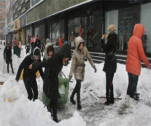   مصر اليوم - عواصف ثلجية تعوق عودة المواطنين الصينيين لأعمالهم