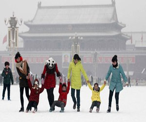   مصر اليوم - تساقط الثلوج لاول مرة خلال فصل الشتاء على بكين