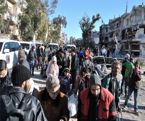   مصر اليوم - ناشطون داخل حمص يترقبون مصير الرجال الموقوفين بعد اجلائهم