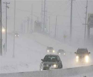   مصر اليوم - عاصفة ثلجية ضخمة تجتاح شمال شرقي الولايات المتحدة