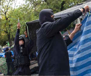   مصر اليوم - الشرطة تحاول استعادة مواقع استراتيجية يحتلها متظاهرون في بانكوك