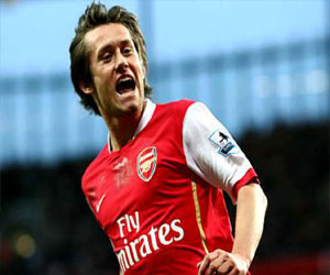   مصر اليوم - إرسنال يجدد التعاقد مع مرتساكر وروزيتسكي