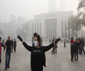   مصر اليوم - الضباب الدخاني يخيم مجددًا على سماء الصين