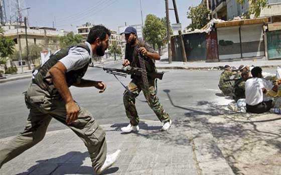   مصر اليوم - اشتباكات عنيفة في اللَّاذقيِّة لتحرير لواء إسكندرون ومقتل 11 في حلب وإدلب وحمص