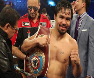 مصر اليوم - الملاكم باكياو يستعيد اللقب من برادلي