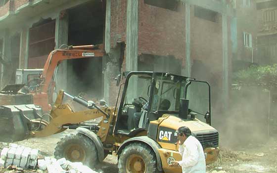   مصر اليوم - حملات لإزالة التعديات على المناطق الأثرية والأراضي الزراعية في البحيرة