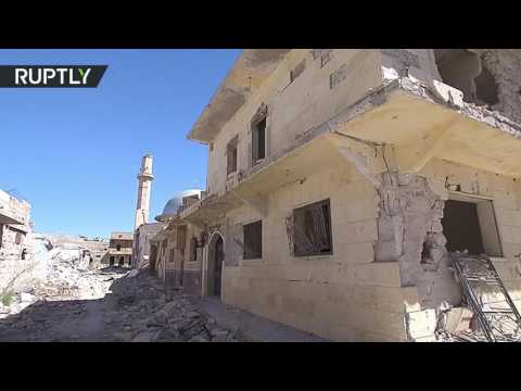 سكان حلب يحاولون العودة إلى بيوتهم المدمرة في سورية
