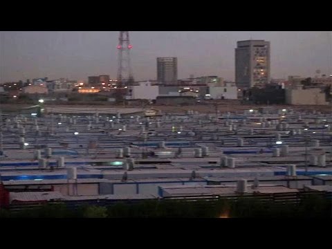 المسيحيون الآشوريون في الموصل ينتقلون إلى مخيمات خاصة بالقرب من أربيل