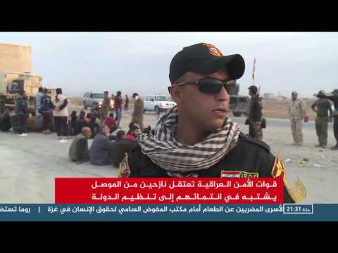 نازحو الموصل يتعرّضون إلى تفتيش دقيق من قبل القوات العراقية