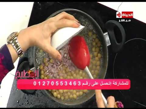 شاهد طريقة إعداد أرز أسباني بالحمص