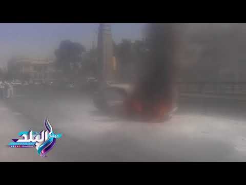 شاهد  لحظة احتراق سيارة أعلى كوبري قصر النيل