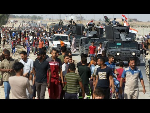 شاهد فرار نحو 100 ألف كردي من كركوك خشية المعارك