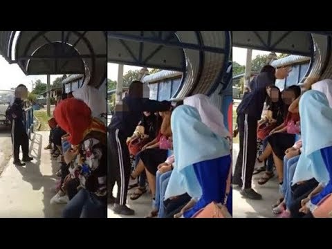 شاب يصفع امرأة في الشارع لعدم ارتدائها الحجاب