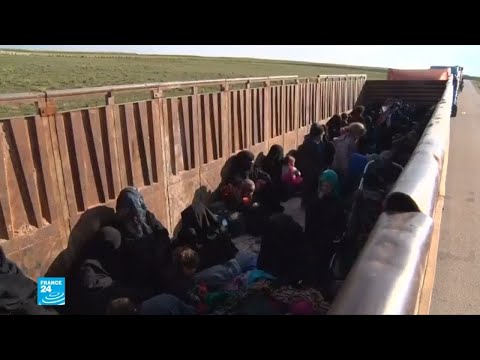 شاهد شاحنات تقل جهاديين وعائلاتهم من آخر معقل لهم