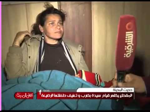 سيدة عراقية تضرب رضيعتها بقسوة