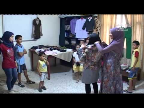 شاهد هنا التربوية الاجتماعية توزع كسوة العيد في لبنان