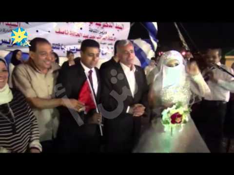 شاهد عروسان يحتفلان بقناة السويس الجديدة في السويس