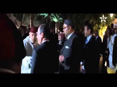 شاهد الرئيس الفرنسي يحاول قرع كأسيْ العصير