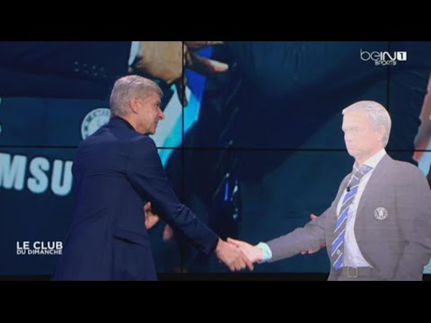 فينغر يصافح مجسم لجوزية مورينيو