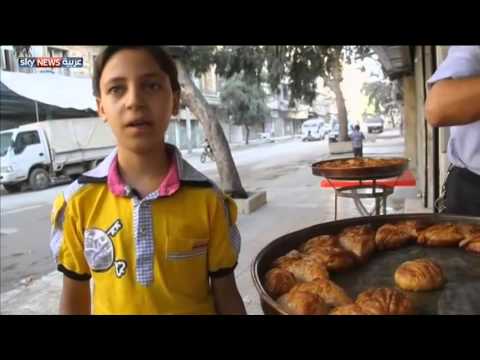 بالفيديو احتفالات تحت وطأة الحرب في حلب