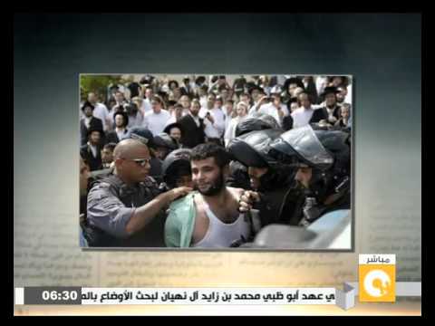 صور شباب فلسطيني يضحك أثناء اعتقاله