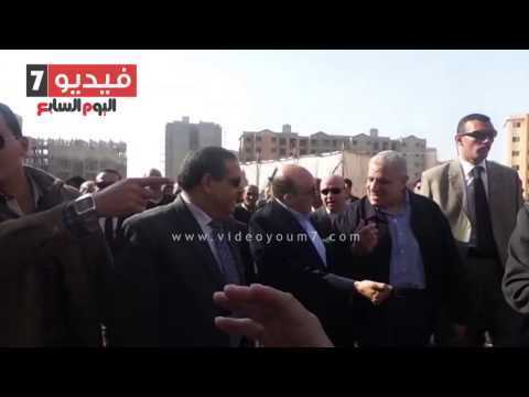 يتفقدون مشروع معًا لتطوير العشوائيات