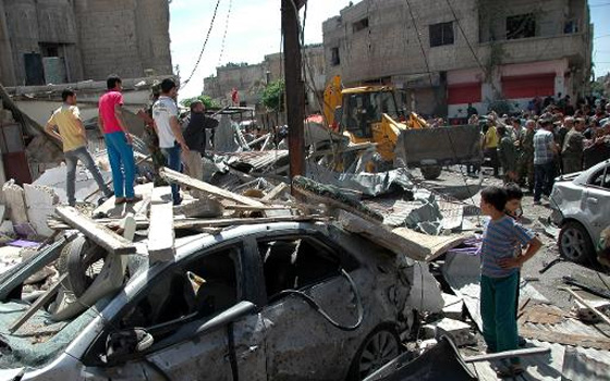   مصر اليوم - مقتل 30 من القوات النظامية في تفجير حاجز في شمال غرب سورية