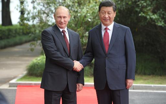   مصر اليوم - شي جينبينغ يستقبل فلاديمير بوتين