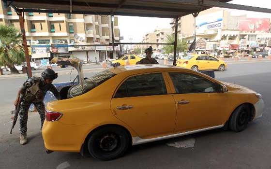   مصر اليوم - هدوء في الموصل والمسلحون يدعون الموظفين للعودة إلى دوائرهم