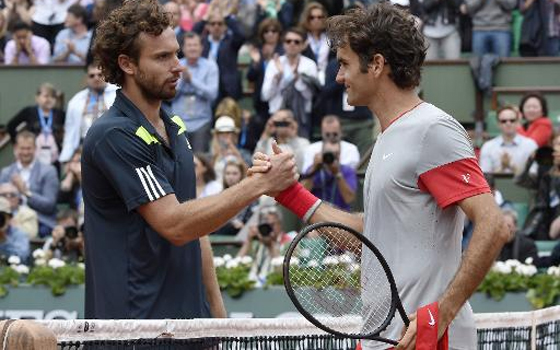   مصر اليوم - رولان غاروس: غولبيس يفي بوعده ويقصي فيدرر