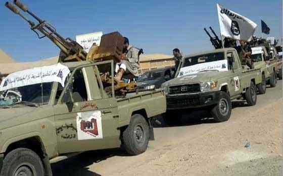   مصر اليوم -  أنصار الشريعة تنشر صورًا لعرض عسكري لعناصرها في ليبيا