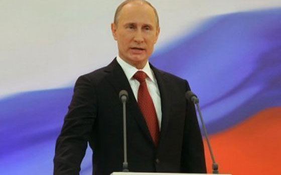   مصر اليوم - بوتين ينفي وجود عسكريين روس في شرق أوكرانيا