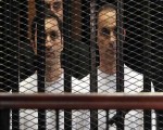   مصر اليوم - بدء محاكمة علاء وجمال مبارك في قضية التلاعب بالبورصة
