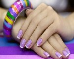 مصر اليوم - الألوان الزاهية تزيِّن أظافركِ في صيف 2014