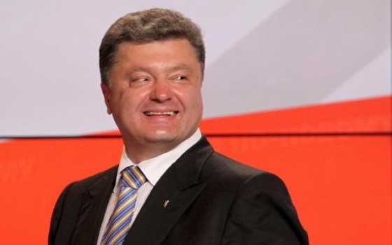   مصر اليوم - بوروشنكو وبوتين يدعوان إلى الحوار مع الانفصاليّين في أوكرانيا