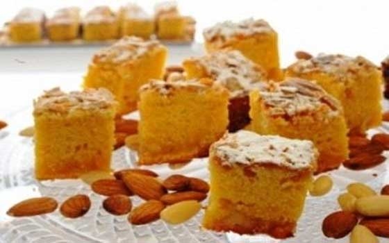   مصر اليوم - تحضير حلوى مربعات اللوز