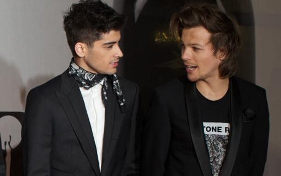   مصر اليوم - لويس توملينسن عضو فرقة وان دايركشن يشتري ناديًا لكرة القدم