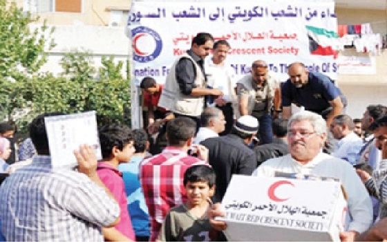   مصر اليوم - الرحمة العالمية توزيع مساعدات رمضانية كويتية على أُسر سورية في لبنان