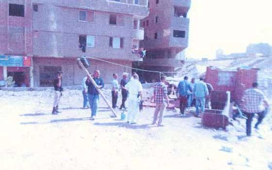 مصر اليوم - إزالة تعديّات على سور محطّة كهرباء في الجيزة