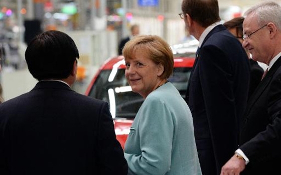   مصر اليوم - ميركل تدفع في بكين عن حسنات مجتمع حر ومنفتح