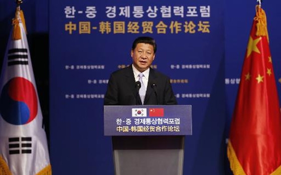   مصر اليوم - شي يركز على الماضي العسكري لليابان للتقرب من كوريا الجنوبية