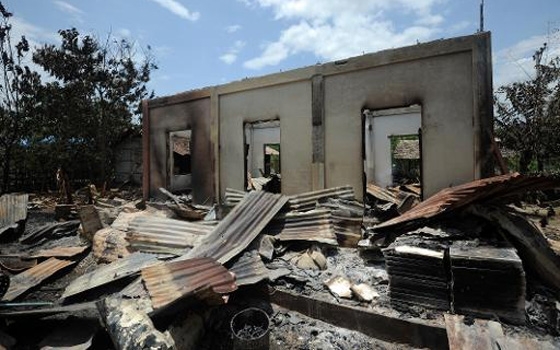   مصر اليوم - إحراق مدرسة في منطقة للمسلمين في مدينة تشهد إضطرابات في بورما