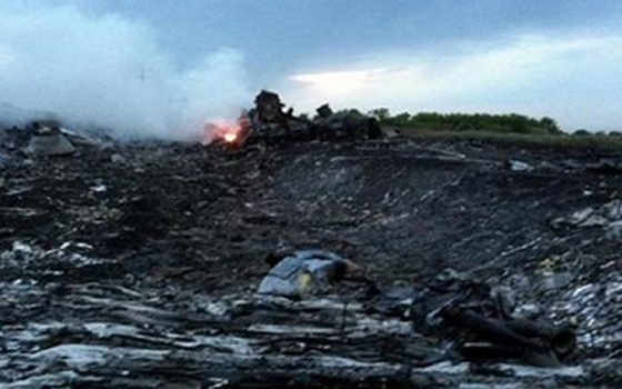   مصر اليوم - أوكرانيا تتهم الأنفصاليين بمحاولة إتلاف الأدلة في موقع تحطم الطائرة