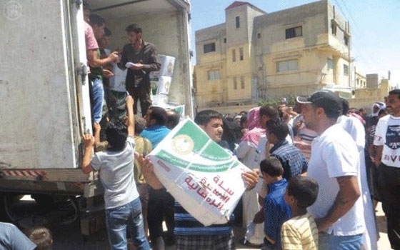   مصر اليوم - جمعية الحليفة الخيرية في حائل توزع السلال الغذائية الرمضانية