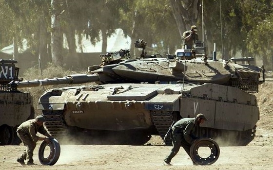   مصر اليوم - إسرائيل تحشد قواتها على تخوم غزة وحركة نشطة في معسكرات الضفة