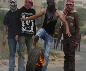   مصر اليوم - مواجهات بين قوات الاحتلال وعشرات الفلسطينيين قرب النبي صالح