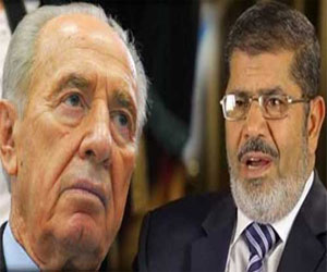   مصر اليوم - بيريز يؤكد تفاجأه برسالة مرسي التي وصفه فيها بـالصديق العظيم